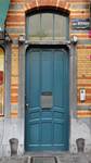 Louis Bertrandlaan 53-61, Schaarbeek, gelijkvloers aan de Bertrandlaan, deur naar de appartementen (© APEB, foto 2012).